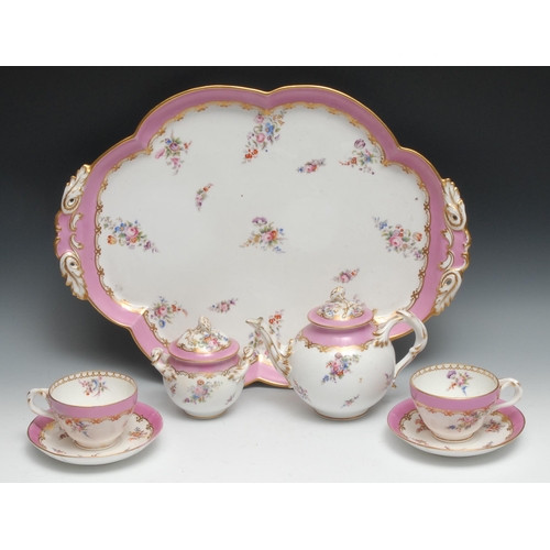 544 - A Coalport cabaret set on tray, comprising lobed oval tray, globular teapot and cover, two cups and ... 