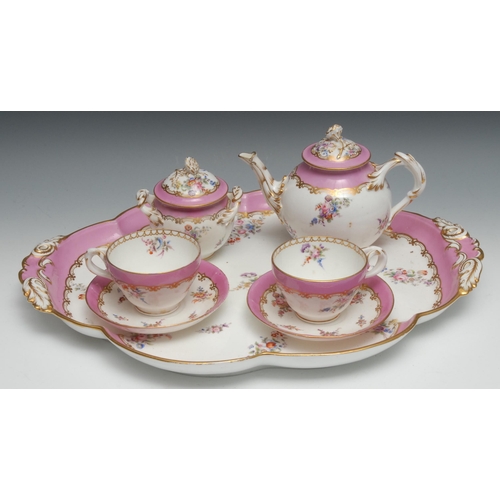 544 - A Coalport cabaret set on tray, comprising lobed oval tray, globular teapot and cover, two cups and ... 