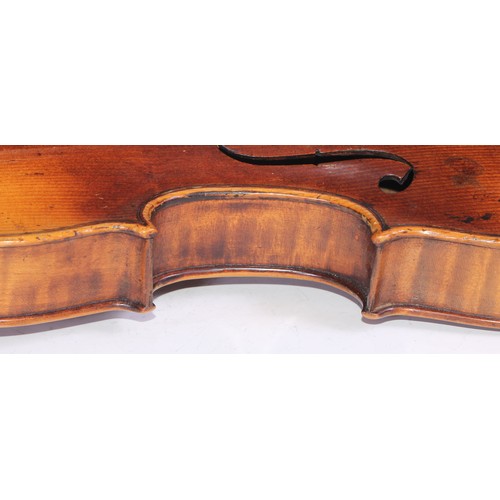 1372 - A violin, the two-piece back 35.5cm long excluding button, rosewood tuning pegs, outlined with purfl... 