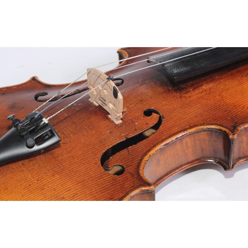 1372 - A violin, the two-piece back 35.5cm long excluding button, rosewood tuning pegs, outlined with purfl... 