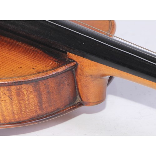 1372 - A violin, the two-piece back 35.5cm long excluding button, rosewood tuning pegs, outlined with purfl... 