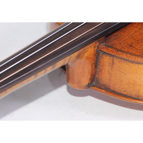 1366 - A German violin, the two-piece back 35.5cm long excluding button, paper Jacobus Augustus label, outl... 