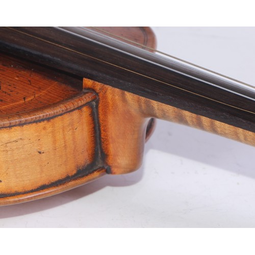 1366 - A German violin, the two-piece back 35.5cm long excluding button, paper Jacobus Augustus label, outl... 