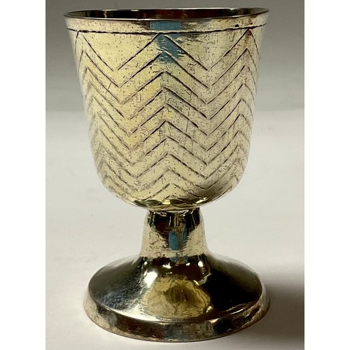 104 - A Continental silver pedestal goblet, possibly German, the bell shaped bowl engraved with chevron ba... 