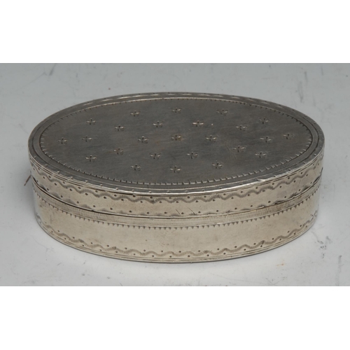 81 - A 19th century French silver oval snuff box engine turned with wriggle-work, stand-away hinged cover... 