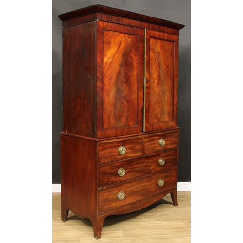 1763 - A Regency mahogany linen press, outswept cornice above a pair of panel doors enclosing four sliding ... 