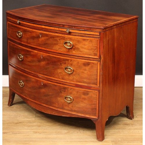 1777 - A Regency satinwood banded mahogany bowfront chest, slightly oversailing top above a slide and three... 