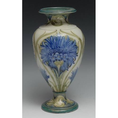 541 - A Moorcroft Macintyre Cornflower pattern vase, tube lined with large flowerheads and foliage, 24cm h... 