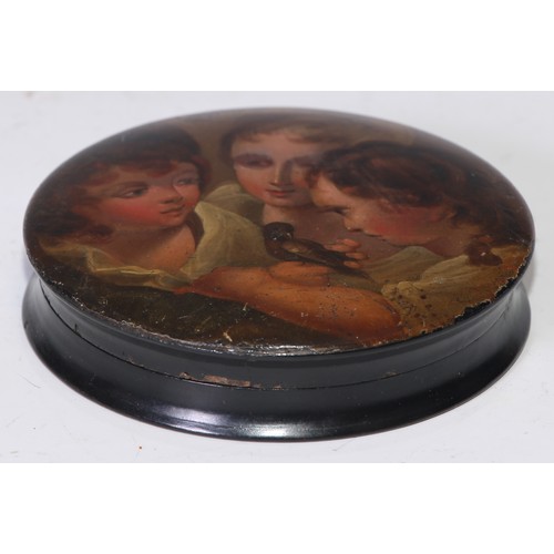 1288 - A 19th century papier mache circular table snuff box, the push-fitting cover painted with three chil... 