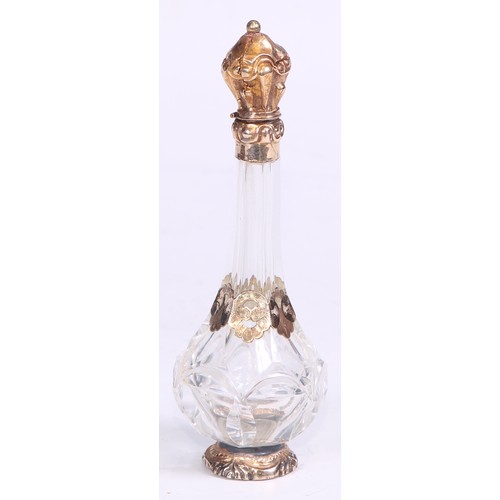 1263 - A Continental gold mounted scent bottle, hinged cover enclosing a stopper, 12cm high, 19th century, ... 