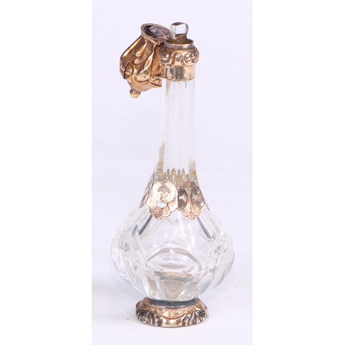 1263 - A Continental gold mounted scent bottle, hinged cover enclosing a stopper, 12cm high, 19th century, ... 