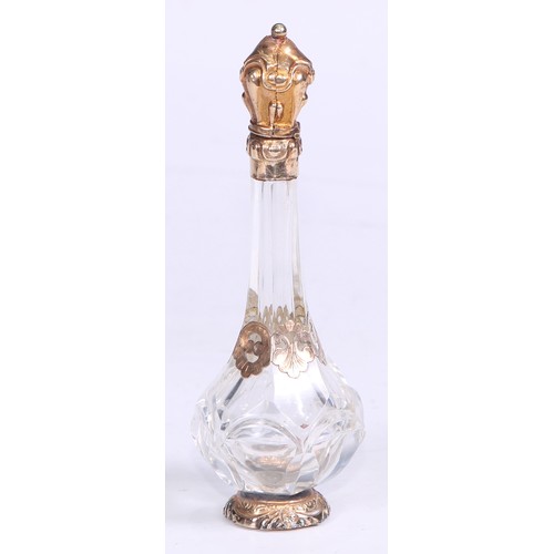 1263 - A Continental gold mounted scent bottle, hinged cover enclosing a stopper, 12cm high, 19th century, ... 