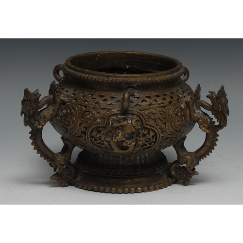 909 - A Chinese bronze hanging censer, pierced and cast with dragons, temple lions and scrolls, 19cm overa... 