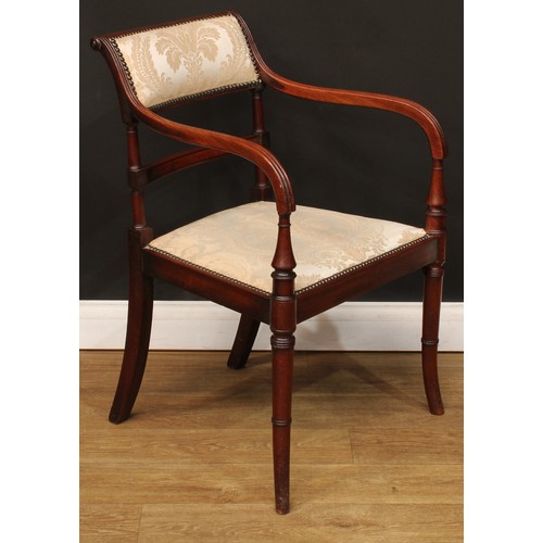 1759 - A Regency mahogany bar-back elbow chair, stuffed-over upholstery with studded borders, channelled ar... 