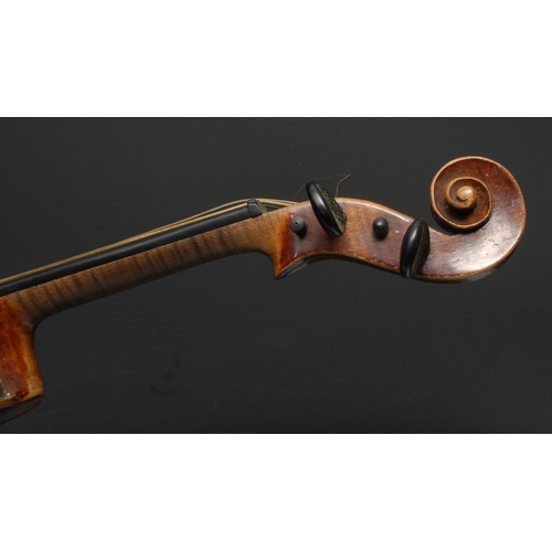 1367 - A German violin, the two-piece back 36cm excluding button, paper label printed Antonius Stradivarius... 