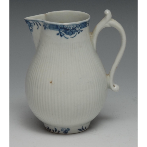 669 - A Worcester ribbed sparrow beak jug, underglaze blue lambriquin border, 10.5cm high,  crescent mark,... 