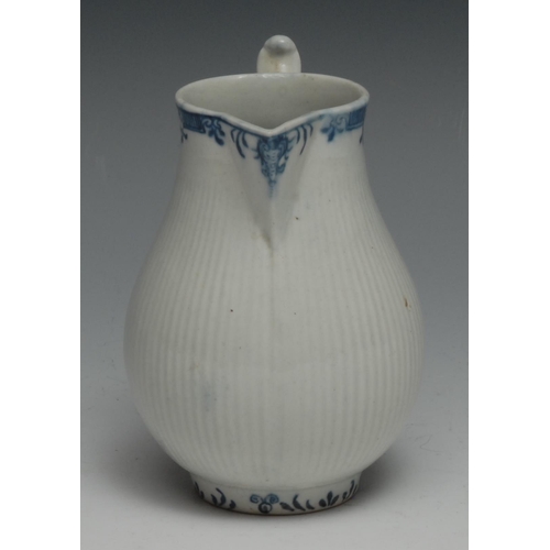 669 - A Worcester ribbed sparrow beak jug, underglaze blue lambriquin border, 10.5cm high,  crescent mark,... 