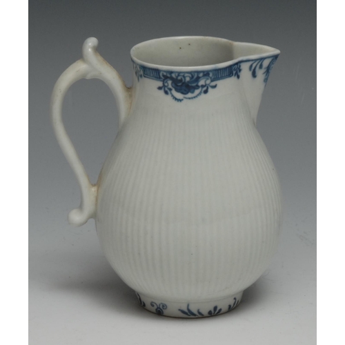 669 - A Worcester ribbed sparrow beak jug, underglaze blue lambriquin border, 10.5cm high,  crescent mark,... 