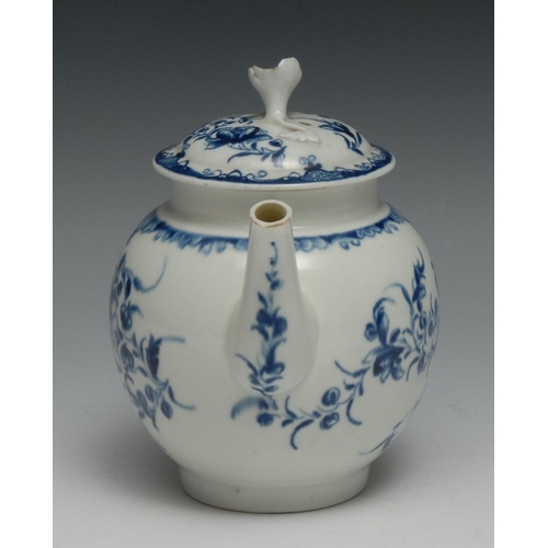 664 - A Worcester Mansfield pattern globular teapot and cover, painted in underglaze blue with flowerhead ... 