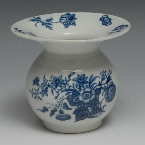 671 - A Worcester Three Flowers pattern spittoon,  printed in underglaze blue with flowers, sprays  and mo... 