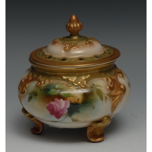 634 - A Royal Worcester pot pourri vase and cover, painted with roses, raised with acanthus scrolls, pierc... 