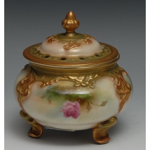 634 - A Royal Worcester pot pourri vase and cover, painted with roses, raised with acanthus scrolls, pierc... 