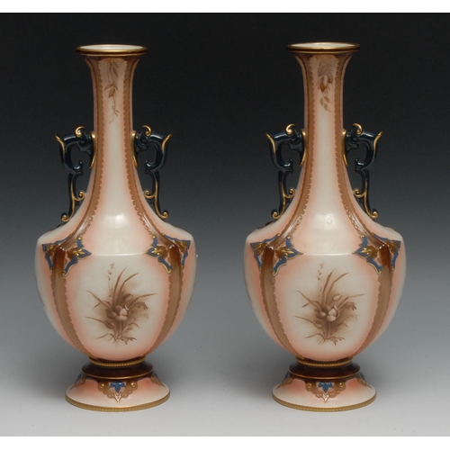 572 - A pair of Hadley's Worcester panelled ovoid two handled vases, painted with birds amongst foliage an... 