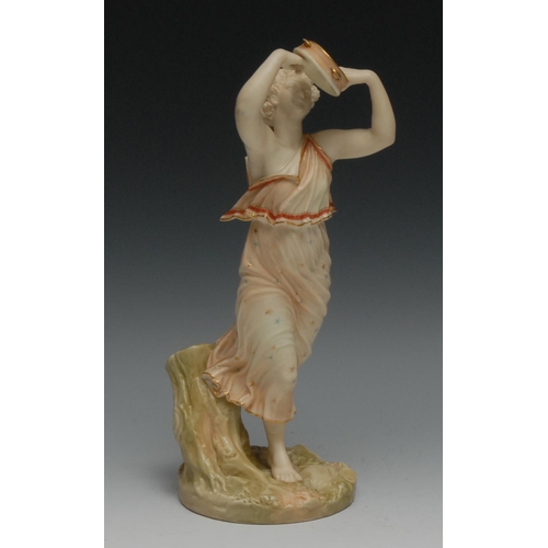 615 - A Royal Worcester figure, modelled by James Hadley, emblematic of music and joy, dancing holding a t... 