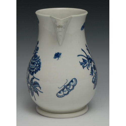 660 - A Worcester cylindrical Natural Sprays pattern mask jug, in underglaze blue, 17cm high, crescent mar... 