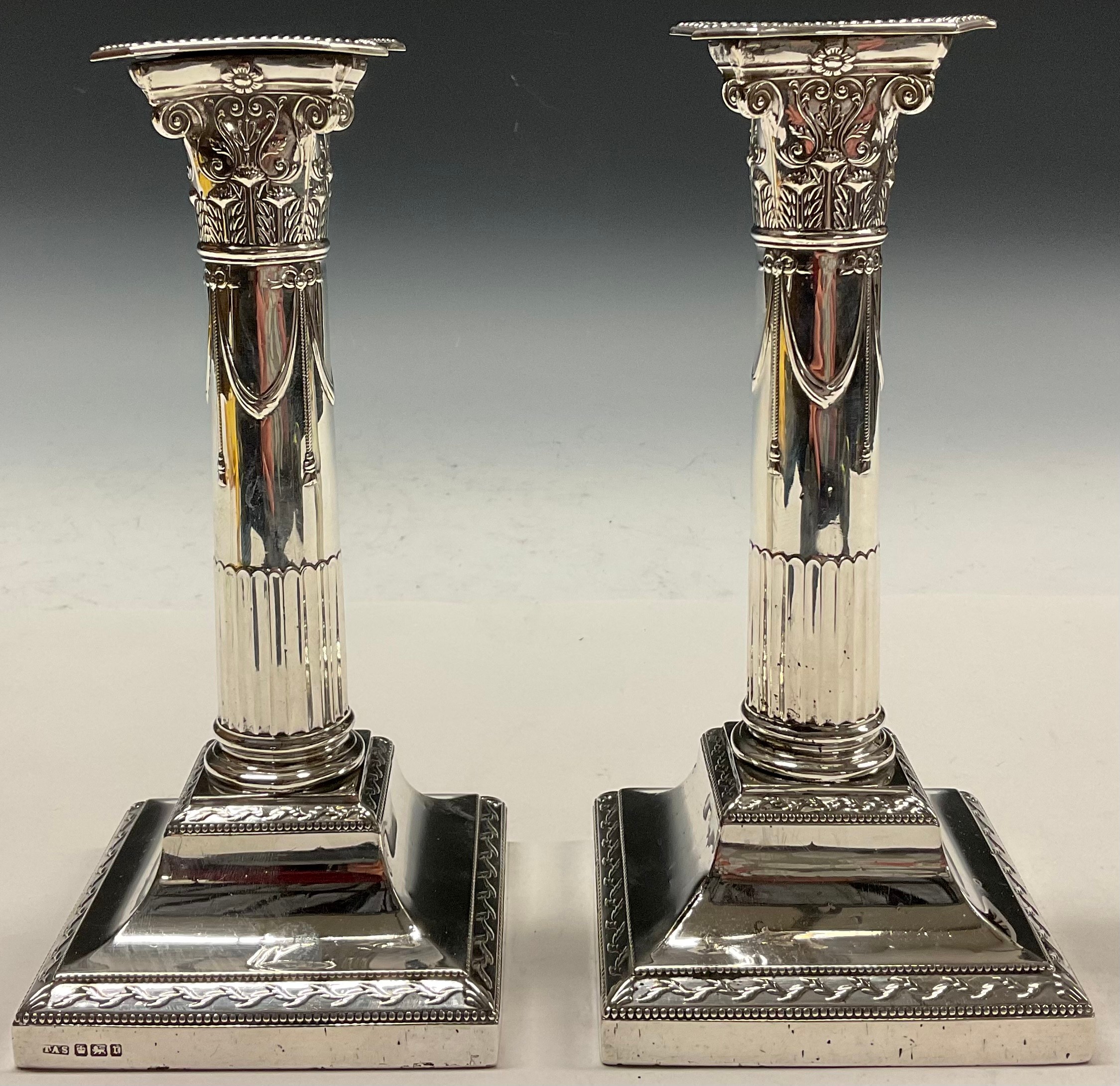 A pair of Edwardian silver stop-fluted - auctions & price archive