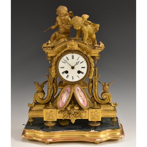 1827 - A Louis XV Revival gilt-metal and porcelain-mounted mantel clock, 9cm white enamel dial inscribed wi... 