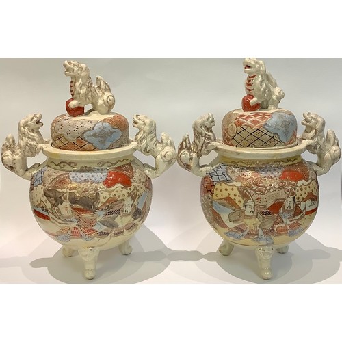 11 - A pair of Japanese satsuma koros and covers, temple lion handles and finials, painted in polychrome ... 