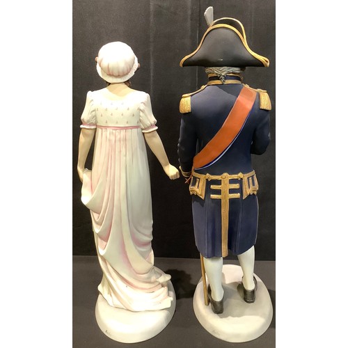 37 - A pair of Boehm porcelain figures, Admiral Lord Nelson and Emma, Lady Hamilton, 43cm and 39cm high (... 
