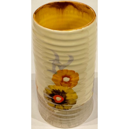 50 - A Clarice Cliff Bizarre Rhodanthe pattern ribbed cylindrical vase, painted with bold flowers on a ho... 