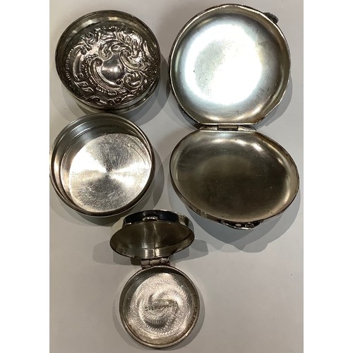 105 - An Edwardian silver circular pill box, Chester 1910; others (3)