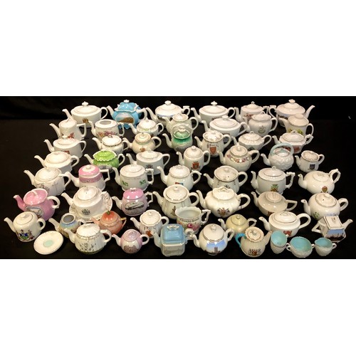 122 - Teapots - assorted late 19th/early 20th century continental porcelain souvenir teapots, British coas... 