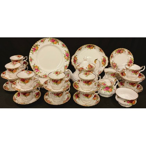 128 - A Royal Albert Old Country Roses pattern tea and dinner service, comprising teapot, sucrier and cove... 