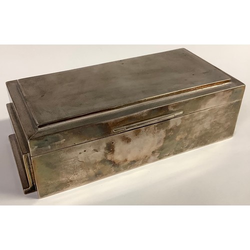 145 - An Art Deco silver table box, the cover engine turned, Sheffield 1935, 19.5cm wide