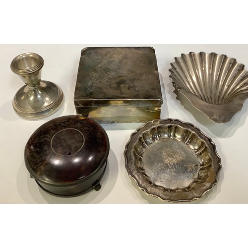 168 - A silver scallop shaped dish, London 1921; a shaped circular trinket dish, Sheffield 1946; a silver ... 