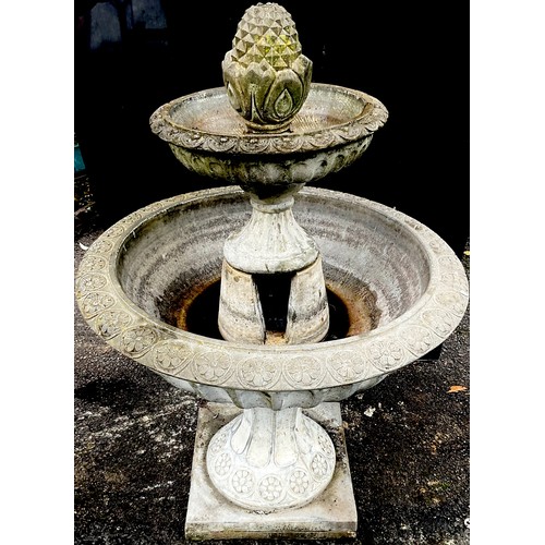 3148 - A two tier garden fountain, pineapple finial, fluted bowls, square base


**Please note that some of... 