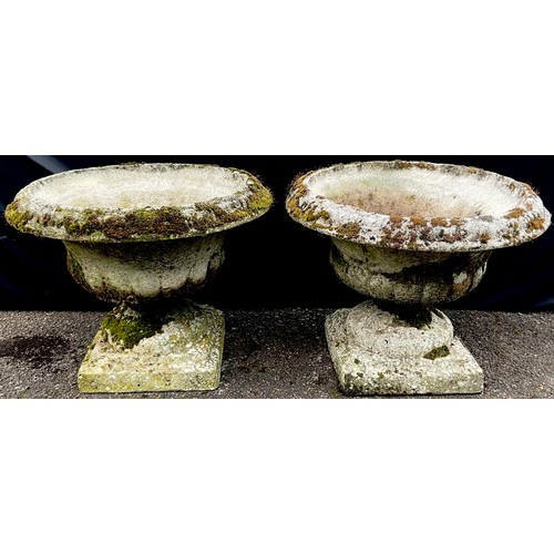 3158 - A pair of composite half fluted campana shaped garden urns


**Please note that some of the lots in ... 