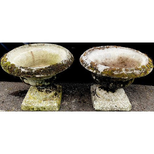 3158 - A pair of composite half fluted campana shaped garden urns


**Please note that some of the lots in ... 