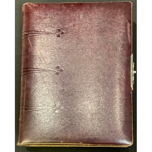 217 - Photography - an Edwardian leather bound carte de visite album, containing various single and groupe... 