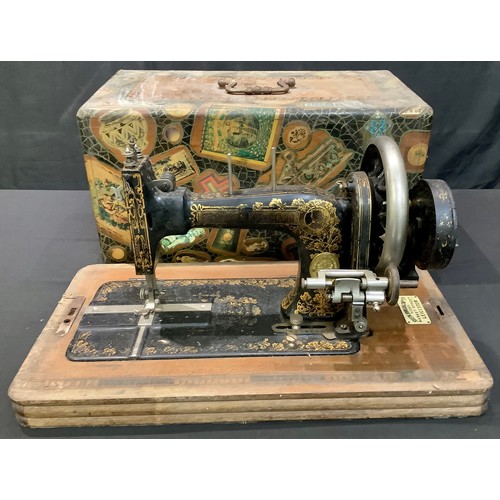 225 - An early 20th century Frister & Rossman hand cranked sewing machine, cased