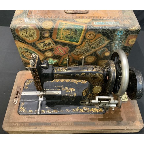 225 - An early 20th century Frister & Rossman hand cranked sewing machine, cased