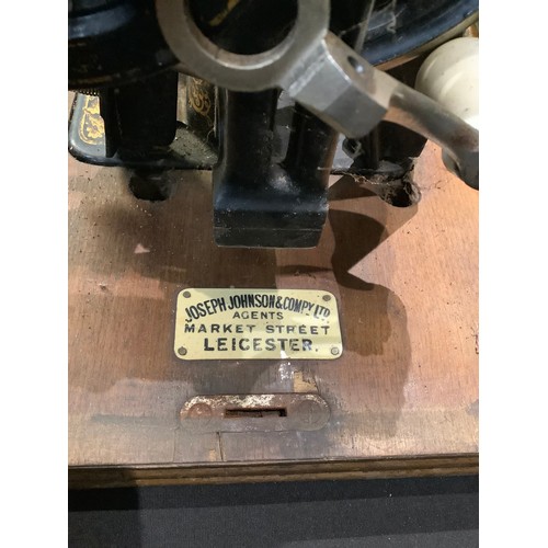 225 - An early 20th century Frister & Rossman hand cranked sewing machine, cased