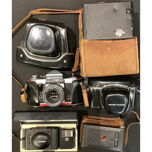 248 - A Praktica Super TL 35mm camera, cased; an Olympus XA 2 35mm camera, boxed; a Kodak A127 camera, bro... 