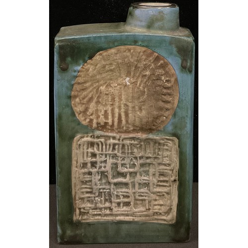 263 - A Troika slab sided chimney vase, decorated and inscribed with a mask and geometric shapes, 19.5cm, ... 