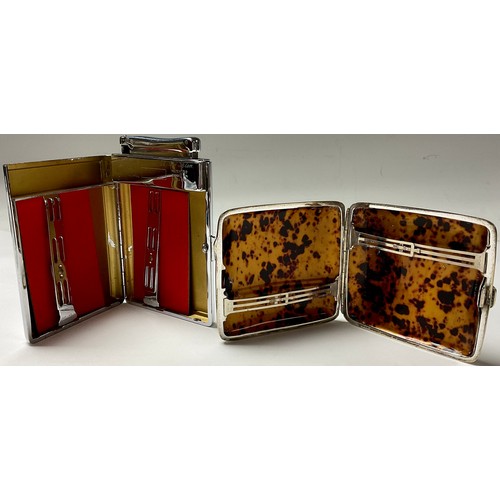 303 - A large Colibri combination cigarette lighter and case, decorated with map of Great Britain; an earl... 