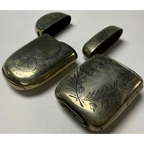 305 - A Victorian rounded rectangular vesta case, 6cm long; another similar (2)